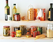 Variety of jars with food ingredients on shelf