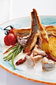 Grilled weever fish with chanterellas and ricotta on plate