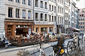 People on street near cafe du Bourg-de-Four, Geneva, Switzerland