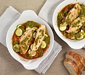 Chicken with vegetable gratin in serving dish