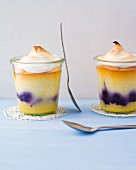 Mini cheese cakes with a meringue topping in jars