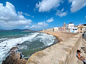 View of Mediterranean sea and city wall at Alghero, Sardinia, Italy