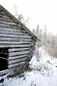View of wooden hut on landscape, Lapland, Finland