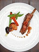 Fried veal rib with mushroom on plate at Capon restaurant