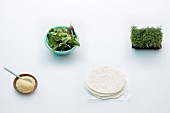 Different ingredients for snacks on white background