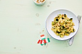 Risotto with zucchini and walnuts on plate