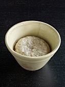 Dough in bowl kept for rising