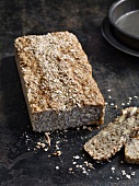 Sliced loaf of three grain almond bread
