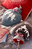 Heart shaped hot water bottles with bird and deer motifs
