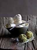 Vanilla truffles in bowl and pumpkin truffles next to bowl