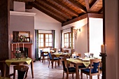 Tables laid in restaurant Hugenhof, Simon forest