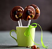 Chocolate lollipops in green cup