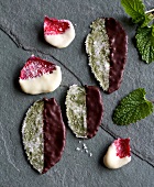 Candid rose petals and leaf made with sugar icing and mint leaves