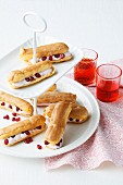Eclairs with pomegranate cream