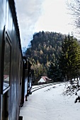 View of Zittau mountains covered with snow from steam locomotive