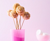 Rice krispies cake pops in pink cups
