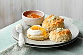 Rosemary scones with clotted cream and apricot jam