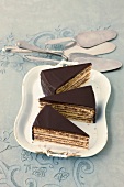 Three slices of Prince Regent cake in tray