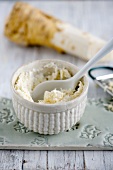Bowl of horseradish with spoon