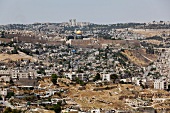 View of cityscape, Temple Mount, Dome of the Rock, and City Wall in Jerusalem, Israel