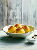 Four potato dumplings in bowl, Bavaria, Germany