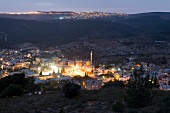 View of illuminated Daburiyya village from Mount Tabor, Nazareth, Israel