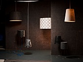 Illuminated ceiling and floor lamps from non-woven wallpaper