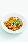 Pumpkin stew with chickpeas on plate