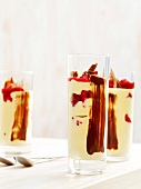 Glasses of stamperl cream with raspberries, Bavaria, Germany