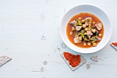 Chickpea soup with mackerel in bowl