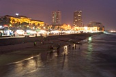 View of Galle Face Green promenade and Indian Ocean at night, Colombo, Sri Lanka