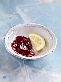 Jam, strawberry and lemon marmalade with lemon slice in bowl