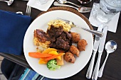 Meal served on plate in the island of Lesser Antilles, Caribbean, Barbados