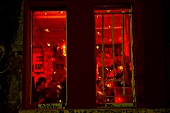 View through night club window at night in Berlin, Germany