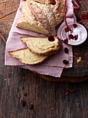 Slice of hazelnut bread plait on pink cloth napkin