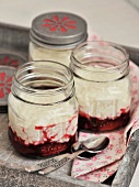 Curd rice pot with plums in preserving jars