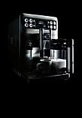 Coffee espresso machine on black background