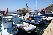 Boats moored at port in Gumusluk, Bodrum, Aegean Region, Turkey