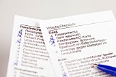 Travel checklist for vacation on white background
