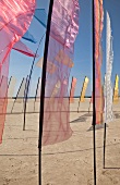 Multi coloured flags at kite festivals at Fano beach, Denmark