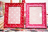 Red and pink frames with flower motifs