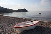 Empty boat on Ovabuku beach, Mesudiye, Datca, Turkey