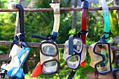 Various scuba masks hanging in Zanzibar, Tanzania, East Africa