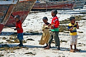 Children playing on beach of Zanzibar, Tanzania, East Africa