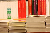 Close-up of stack of books on shelf