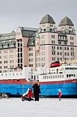 Building of Dagbladet and ship at port in Oslo, Norway