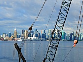 Cityscape of North Vancouver overlooking waterfront and crane, British Columbia, Canada