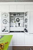 Kitchen closet with various kitchen equipment