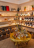 Wine bottles on shelves and table in Winery Faber store in Freiburg, Germany