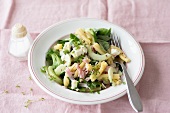 Macaroni, ham and cucumber salsa on plate